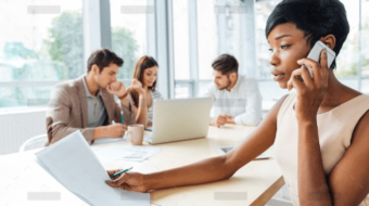 demo-attachment-2303-serious-businesswoman-with-documents-talking-on-P9Q6LX6@2x