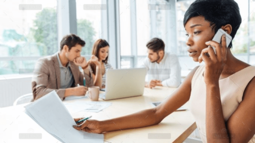 demo-attachment-2303-serious-businesswoman-with-documents-talking-on-P9Q6LX6@2x